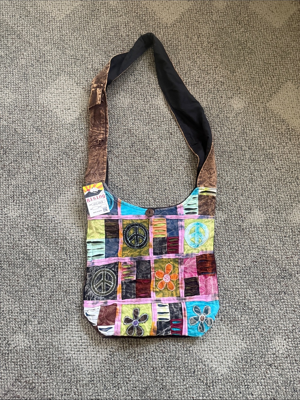 Rising International Multicolor Patchwork Peace Sign & Floral Crossbody Bag